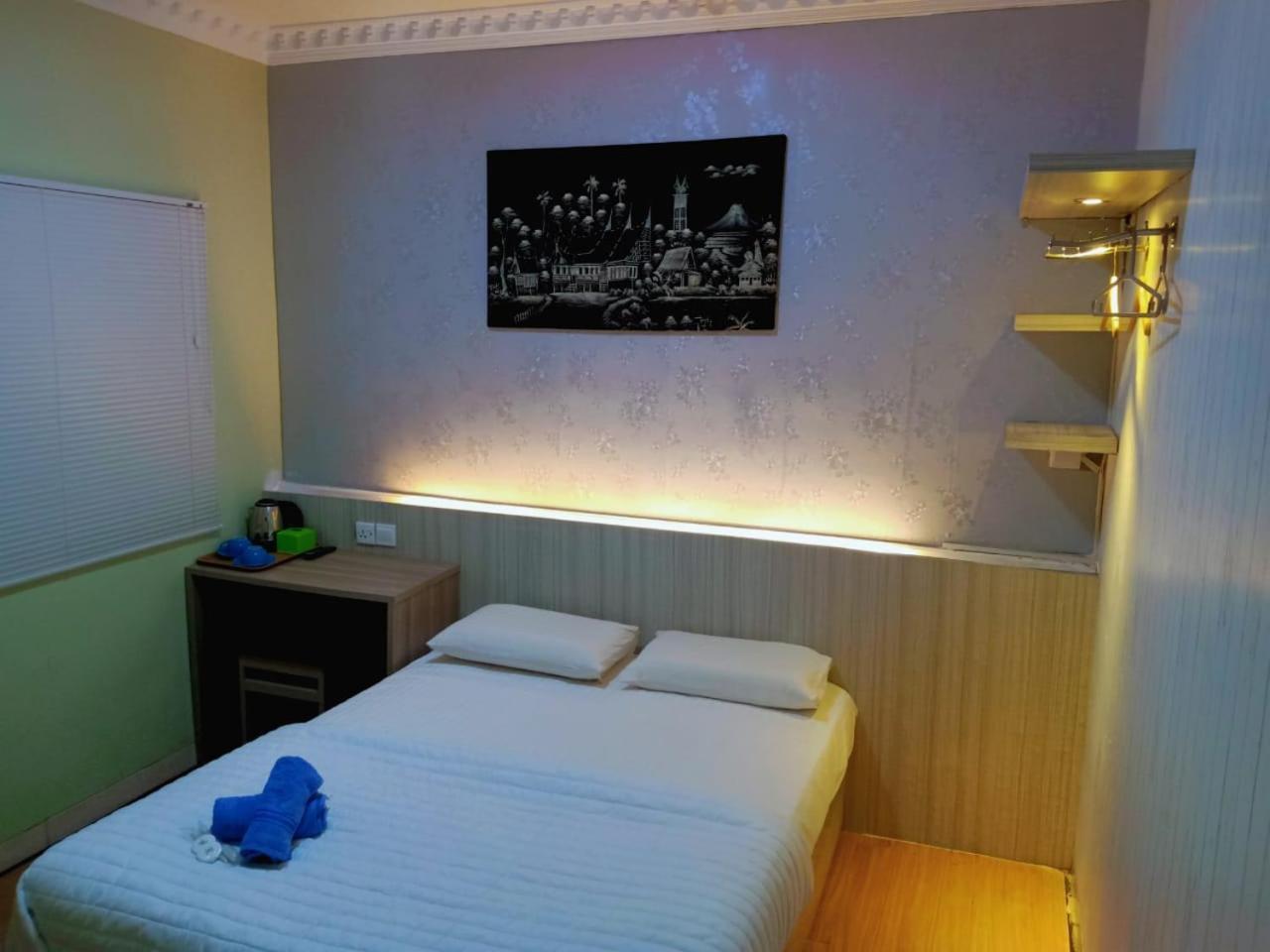 SleepRest @ Golden Prima Hotel Batam Værelse billede